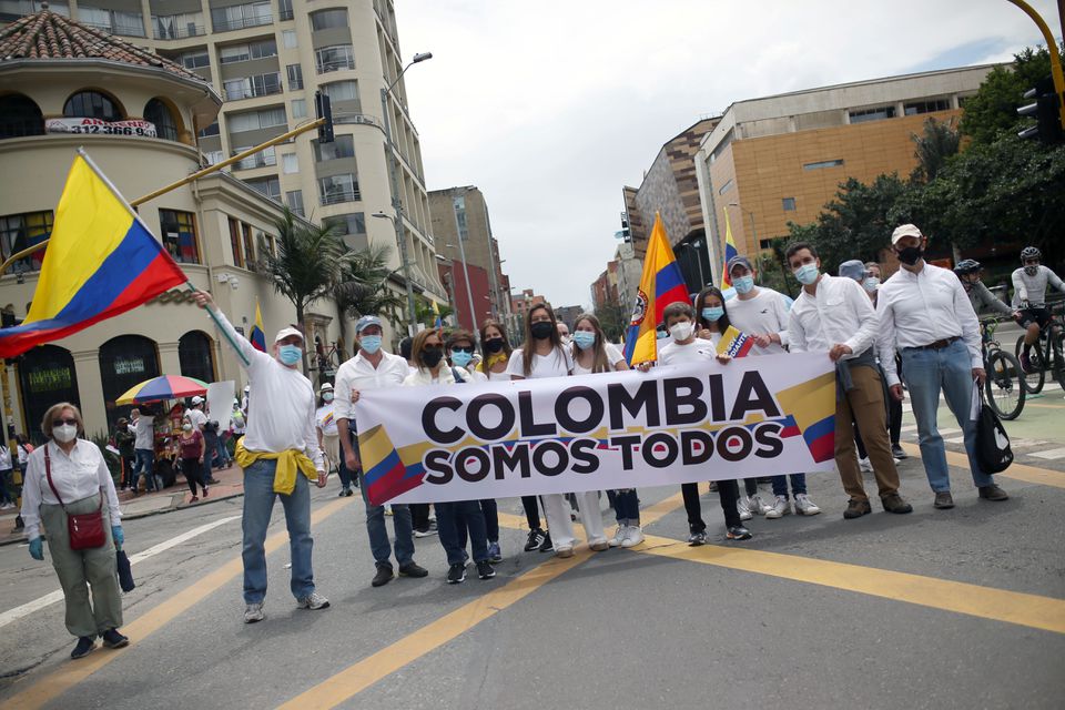 Thousands march in Colombia’s Bogota to demand end to protests, roadblocks